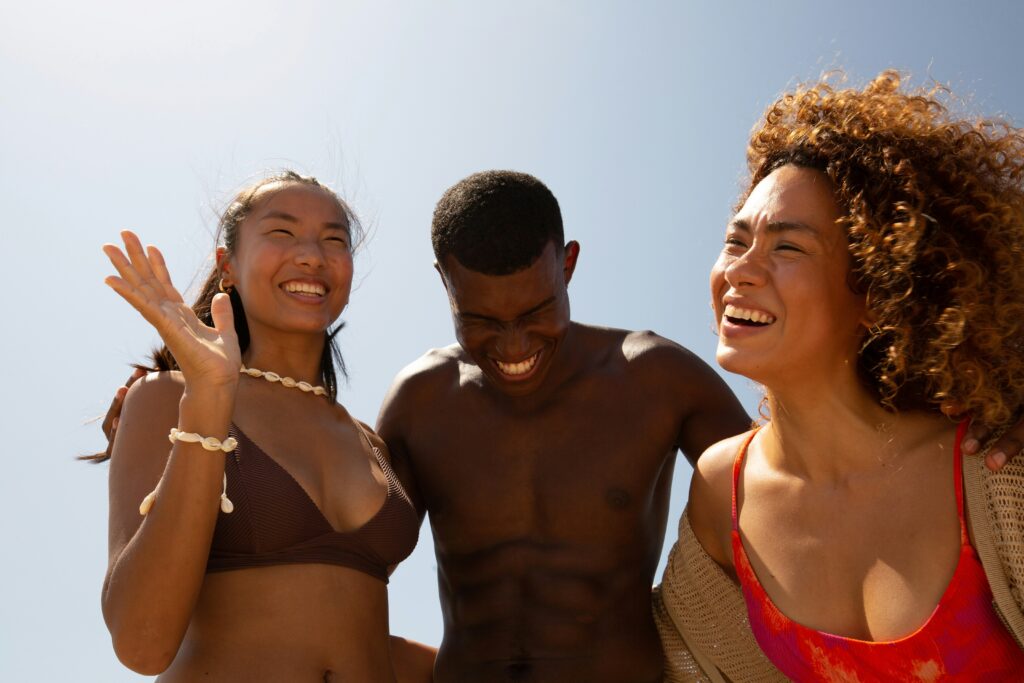 Group of people tanning outside under natural sunlight